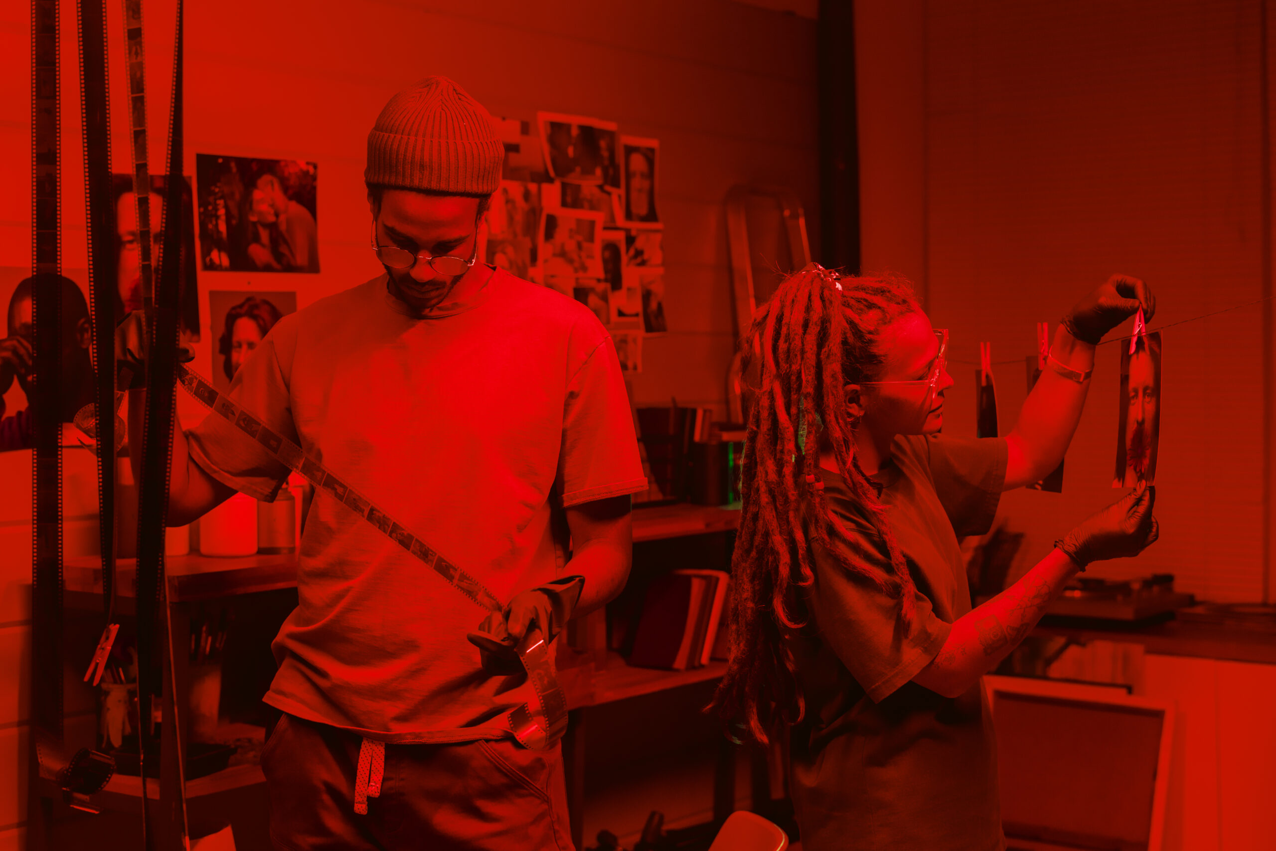 Red light therapy panel with deep red glow in treatment room