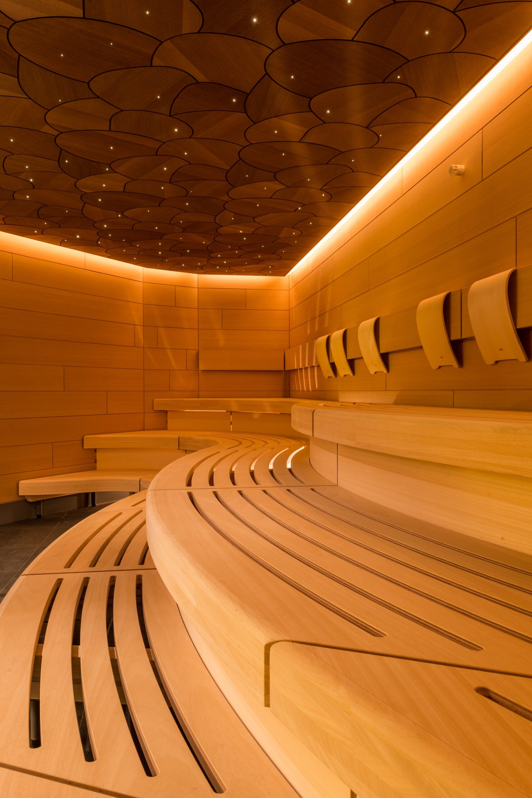 Infrared sauna therapy cabin with warm amber glow